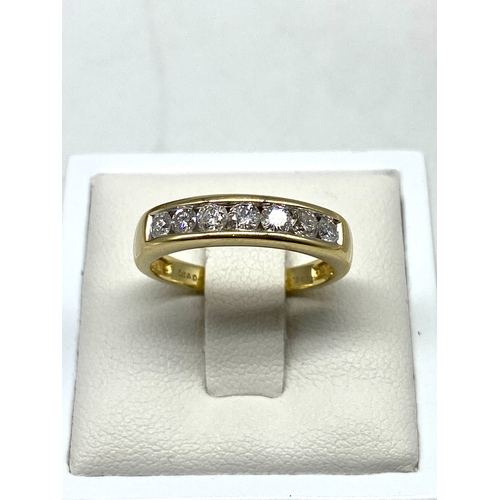 45 - An 18ct yellow gold channel set eternity diamond ring, 0.50ct diamond approx, size M, weight 4.1 gra... 