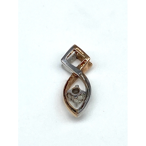 48 - A 9ct rose gold diamond set pendant, weight is 0.95 grams approx, 20mm x 6mm