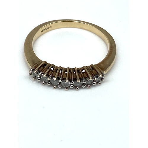 57 - A 9ct yellow gold diamond eternity ring, size N, 2.4 grams in weight approx, approx 0.25ct diamonds,