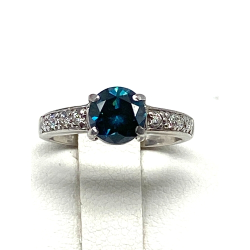 60 - An 18ct white gold blue diamond ring, approx 1ct diamond, diamond is coloured treated, 3.6 grmas app... 