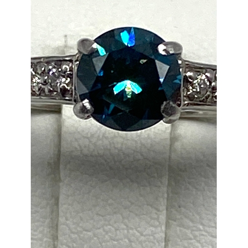 60 - An 18ct white gold blue diamond ring, approx 1ct diamond, diamond is coloured treated, 3.6 grmas app... 