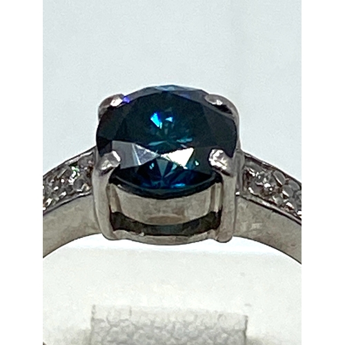 60 - An 18ct white gold blue diamond ring, approx 1ct diamond, diamond is coloured treated, 3.6 grmas app... 