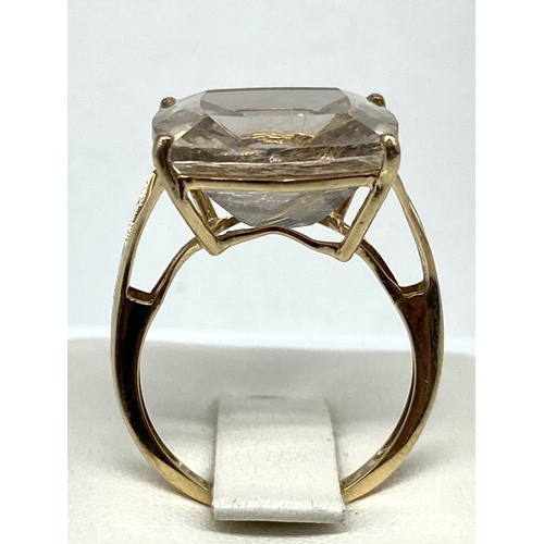 63 - A 9ct yellow gold dress ring, large centre stone is 15mm x 15mm, 4.2 grams approx weight, size N