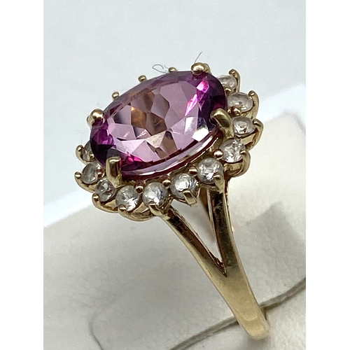 65 - A 9ct yellow gold dress ring, pink/red coloured stone, 3.7 grams approx weight, size N