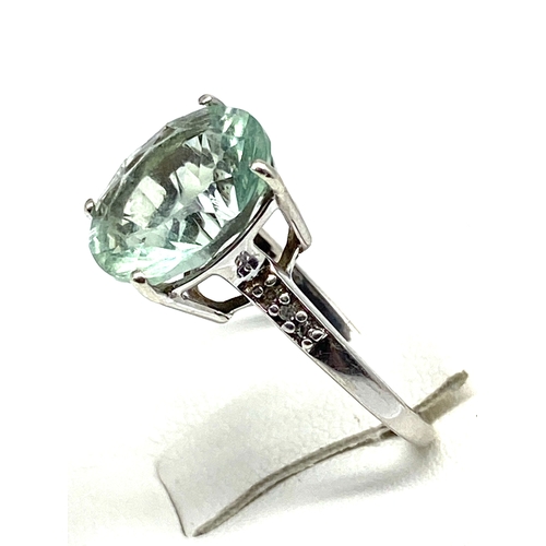 71 - A 9ct yellow gold dress ring, large centre green stone, weight is 3.2 grams approx, size N