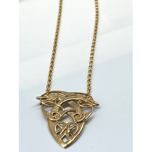 18 - A 9ct yellow gold Ola Gorie Scottish pendant & chain, 16 inches long chain & pendant drop of 38mm x ... 