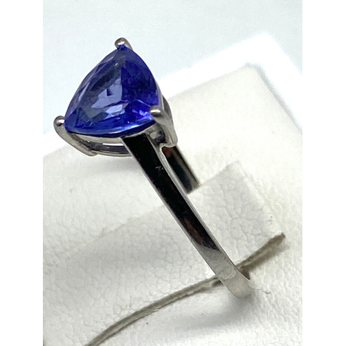 66 - A platinum & tanzanite dress ring, approx 1ct triangle shaped tanzanite, 2.4 grams approx weight, si... 