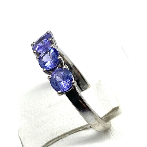 68 - A 9ct white gold tanzanite dress ring, set with 4 tanzanite stones, size J, 2.1 grams in weight appr... 