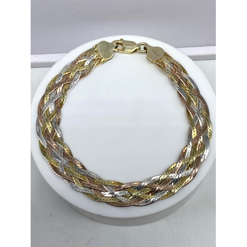 2 - An 18ct white gold woven bracelet, 7 inches long x 20mm wide, approx weight is 28.6 grams , in very ... 