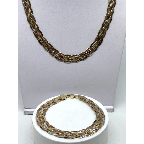 134 - A silver bracelet & necklace set, mesh design with tri colour gold plating, 25 grams approx weight