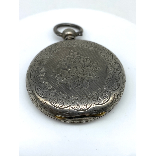 211 - A silver ladies pocket watch, will require some work, no glass and bezel is broken, 33 grams approx ... 