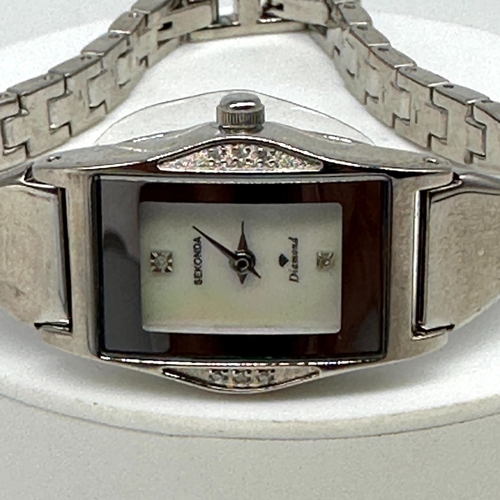 174 - A Sekonda diamond watch, never been worn, mother of pearl face