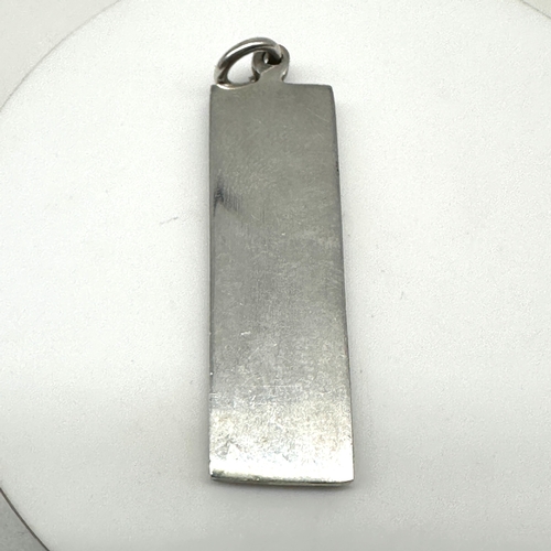 230 - A silver ingot bar, 16.2 grams approx weight, hallmarked, 50mm x 7mm