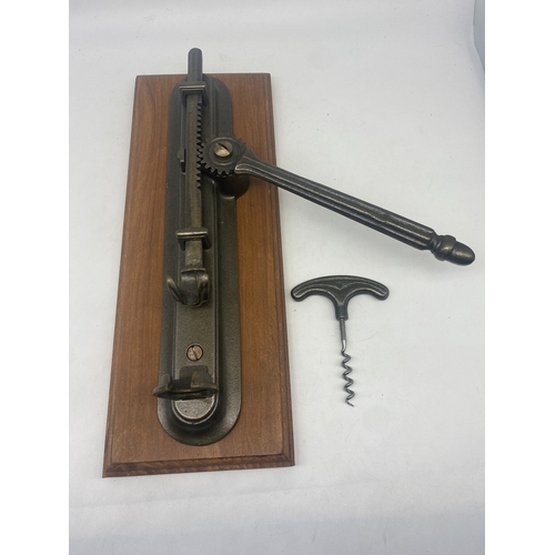 239 - A wall mounted bottle opener