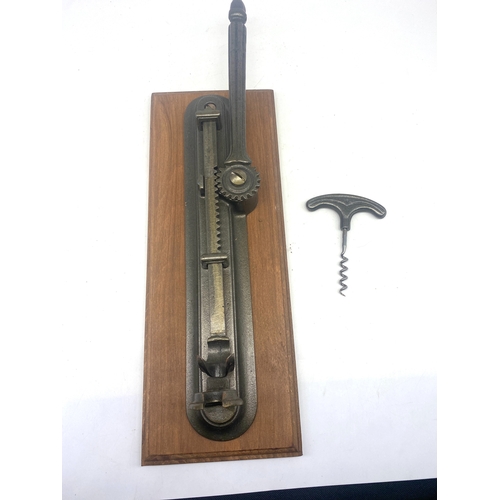 239 - A wall mounted bottle opener