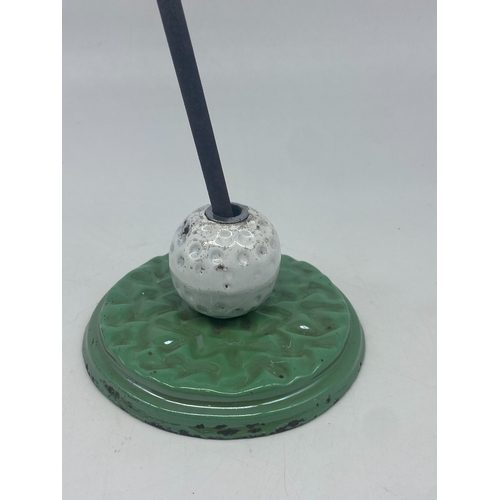 244 - Golf ball & club metal poker set, 14 1/2 inches high x 5 inch diameter