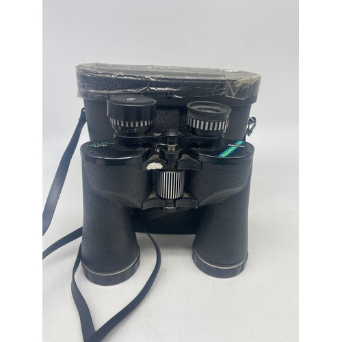 379 - A pair of Chinon binoculars, 12 x 50 extra wide angle field 5.5