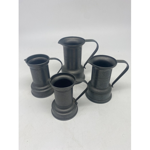 385 - 4x pewter art deco jugs, 2x Damart jugs 4