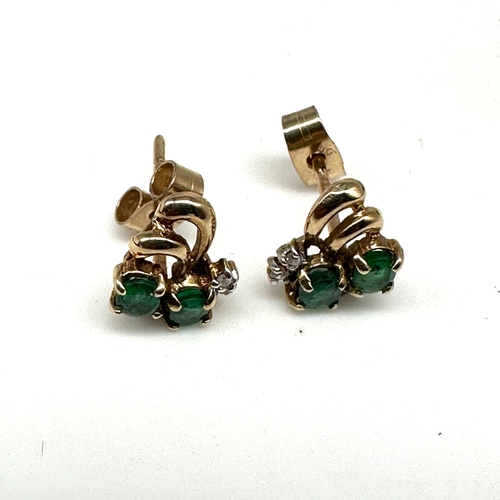 94 - A pair of 9ct yellow gold emerald & diamond stud earrings, 1.4 grams approx weight