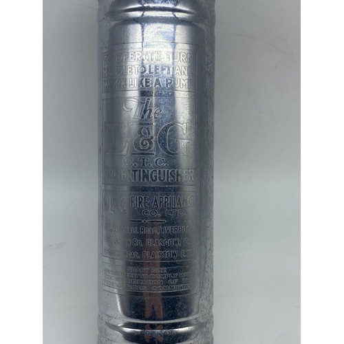 421 - A chrome vintage fire extinguisher