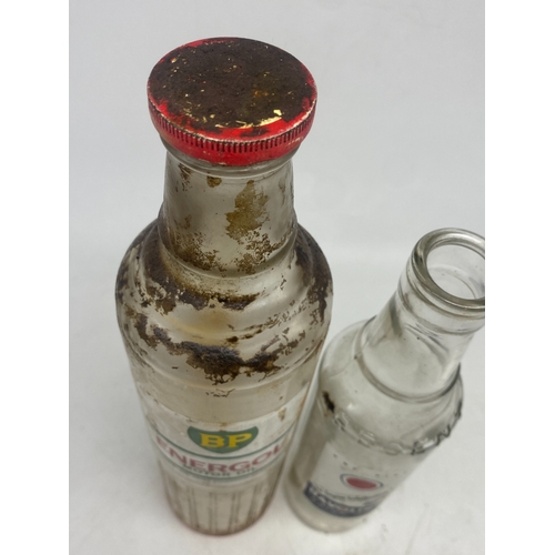 438 - A vintage BP oil bottle & Havolin oil bottle