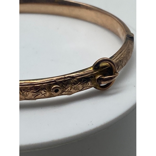 95 - A 9ct rose gold Victorian bangle, has a safety chain, 6 grams approx weight, semi hollow bangle