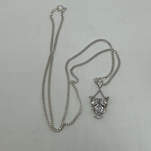 475 - An 18ct white gold diamond pendant & silver chain, 3 old cut diamonds, approx total 1.94ct diamond, ... 