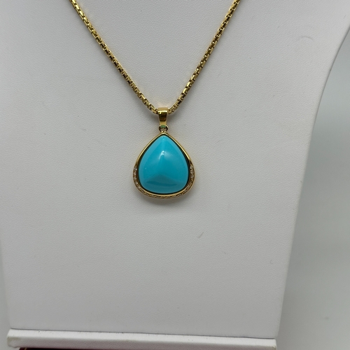 506 - An 18ct yellow gold turquoise & diamond pendant & chain, hallmark is stag with antlers used by Portu... 