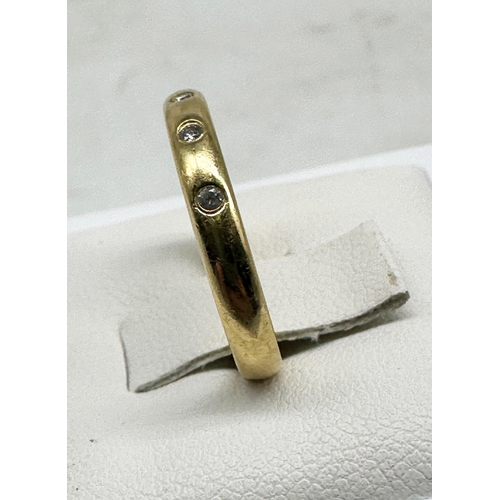 510 - An 18ct yellow gold diamond band
in good condition
size J