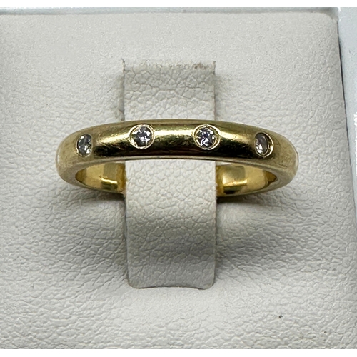 510 - An 18ct yellow gold diamond band
in good condition
size J