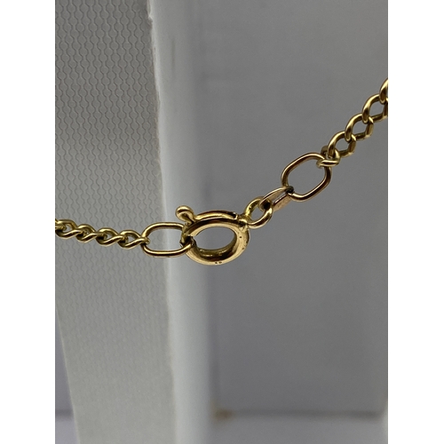 522 - A 9ct yellow gold curb chain, 9.5 grams in weight approx, 21 inches long, in good condition