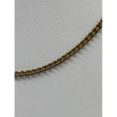 522 - A 9ct yellow gold curb chain, 9.5 grams in weight approx, 21 inches long, in good condition