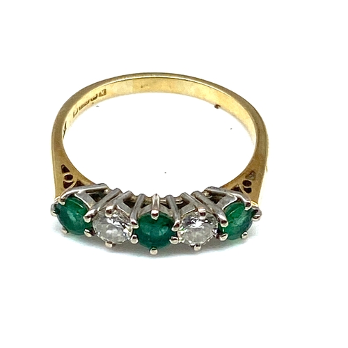 523 - An 18ct yellow gold emerald & diamond dress ring, diamonds approx 0.50ct, emeralds are 0.60ct approx... 