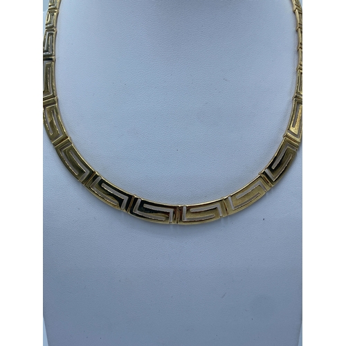 1 - A 9ct yellow gold Greek design necklace, 18 inches long approx, 21grams in weight approx, like new c... 