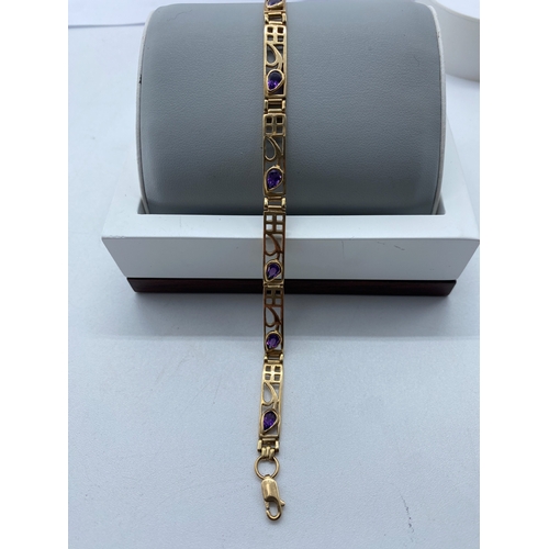 12 - A 9ct yellow gold Scottish design bracelet, 9.6 grams in weight approx, 7 1/2 inches long, no signs ... 