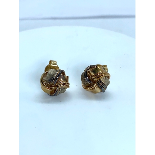 15 - A pair of 9ct tri-coloured stud earrings, knot design, 2.6 grams approx combined weight, in nice con... 