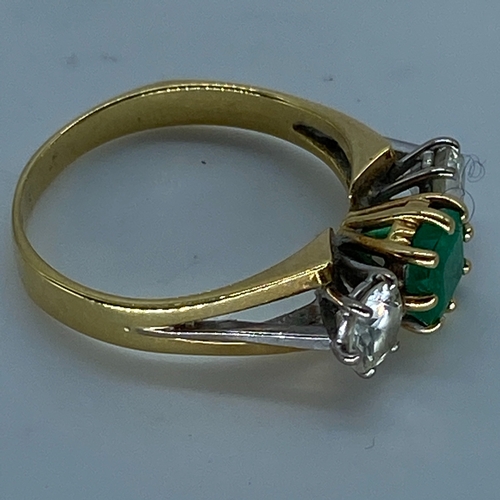 18 - An 18ct yellow & white gold shoulder emerald & diamond dress ring, very nice emerald stone with good... 