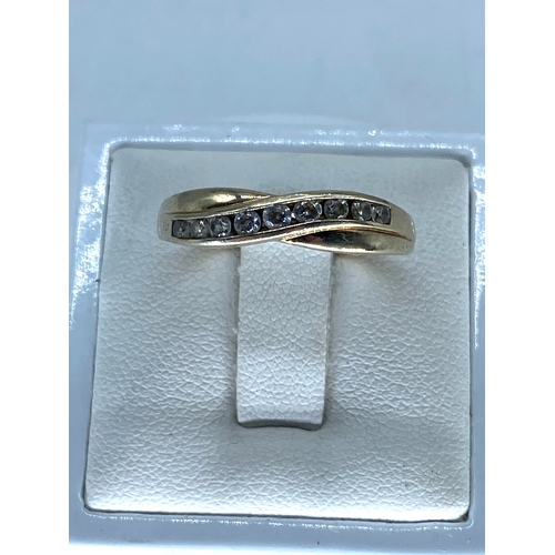 180 - A 9ct cz stone yellow gold dress ring, weight is 2 grams approx, size Q, in lovely condition