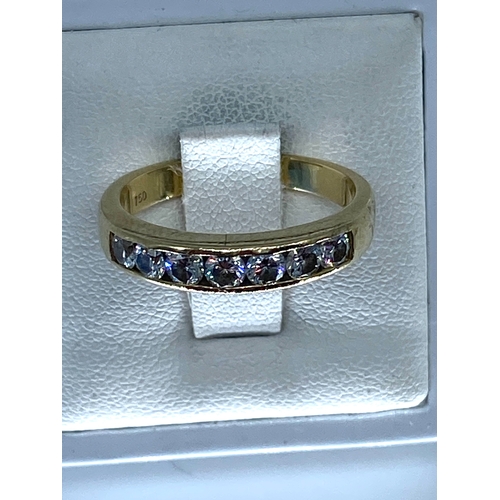 183 - An 18ct yellow gold diamond eternity ring, 4.9 grams approx, size P, set with 7 round brilliant cut ... 