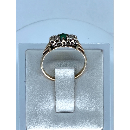 185 - A 9ct yellow gold emerald & diamond 3 stone ring, size M, weight is 1.4 grams approx