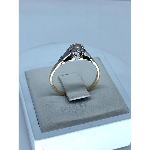 190 - A 9ct yellow gold & platinum diamond solitaire ring, size M, 1.3 grams in weight approx