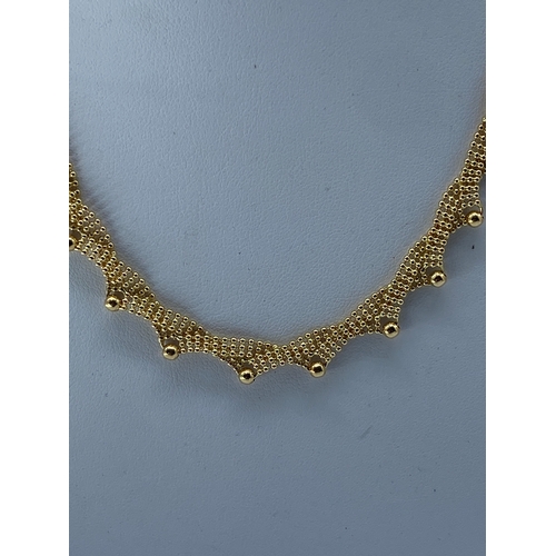 2 - An 18ct yellow gold fancy design necklace, 18 inches long approx, 16 grams in weight approx, in fant... 