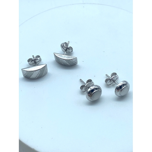 23 - 2x pairs of 9ct white gold stud earrings, 1.7 grams total approx weight, both pairs are in lovely co... 