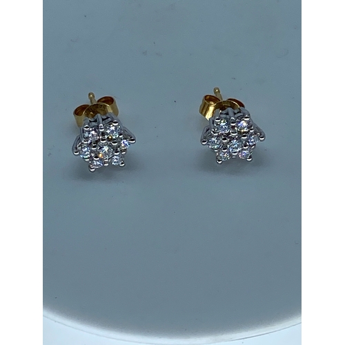 27 - A pair of 18ct yellow gold daisy diamond cluster earrings, total approx weight 1ct of diamonds, very... 