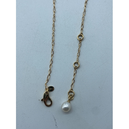 3 - A 14ct yellow gold seed pearl & gold pearl drop necklace, necklace has 3 extenders, pearl on the las... 