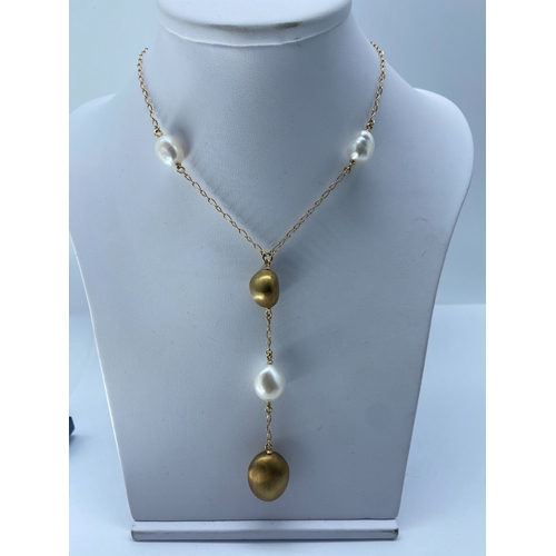 3 - A 14ct yellow gold seed pearl & gold pearl drop necklace, necklace has 3 extenders, pearl on the las... 