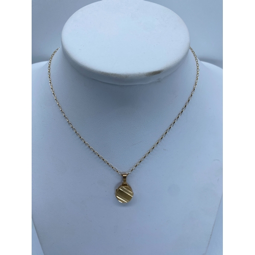 33 - A 9ct yellow gold locket pendant & chain, chain is 16 inches long approx, locket is 22mm x 12mm appr... 