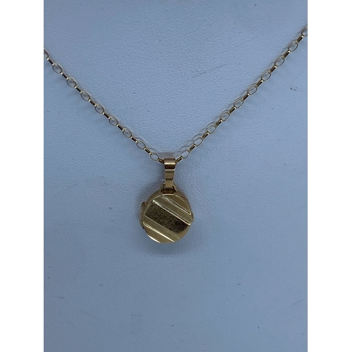 33 - A 9ct yellow gold locket pendant & chain, chain is 16 inches long approx, locket is 22mm x 12mm appr... 