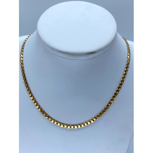 38 - A 9ct yellow gold solid link curb chain, 18 inches long approx, links are 4mm wide, 15.4 grams in we... 