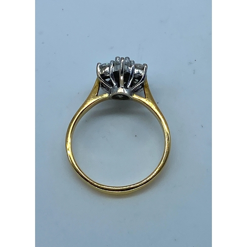 42 - An 18ct yellow gold daisy design diamond ring, very nice condition, like new, approx 0.50ct diamonds... 